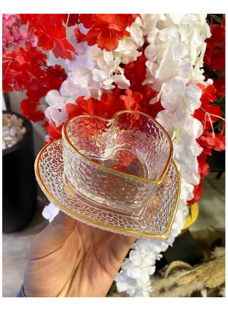 A gold-rimmed heart-shaped dessert set perfect for muhallebi, qamar al-din, and rice pudding. Also suitable for fruits, nuts, sweets, and salads. The plates can be used for pickles and cakes. The set includes 12 pieces: 6 bowls and 6 plates. - Image 4